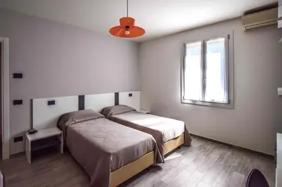 Letto o letti in una camera di gambisa street