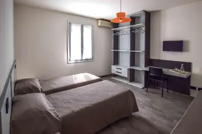 Letto o letti in una camera di gambisa street