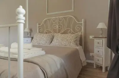 Letto o letti in una camera di CàMia Lovely house ValDiVara 5Terre hiking