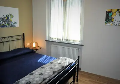 Letto o letti in una camera di Liguria Village