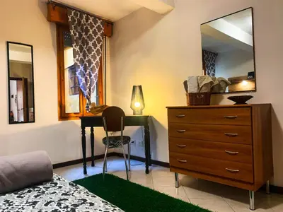 Letto o letti in una camera di Grazioso bilocale pieno centro