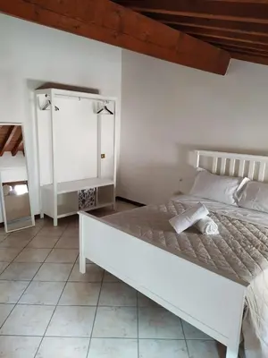 Letto o letti in una camera di Carducci 49