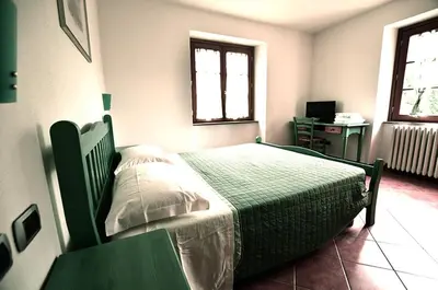 Letto o letti in una camera di Agriturismo Ca' del Sartu