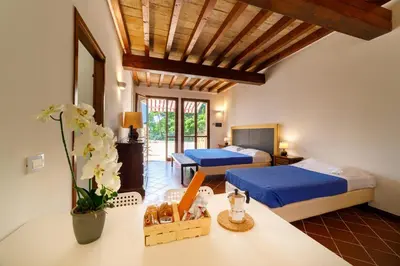 Letto o letti in una camera di La Corte del Mulino