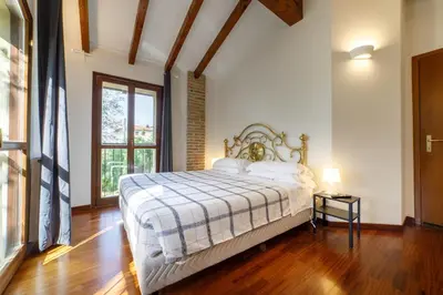 Letto o letti in una camera di La Corte del Mulino