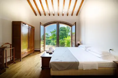 Letto o letti in una camera di La Corte del Mulino
