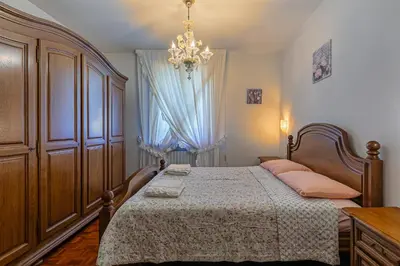 Letto o letti in una camera di Villa Ferrari
