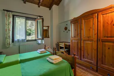 Letto o letti in una camera di Villa Ferrari