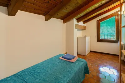 Letto o letti in una camera di Villa Ferrari