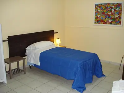 Letto o letti in una camera di Casa Vacanze Lillo