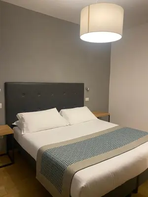 Letto o letti in una camera di Hotel dei Gonzaga, MantegnaHotels