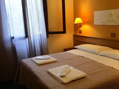 Letto o letti in una camera di Hotel Parco Fola