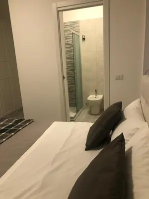 Letto o letti in una camera di Nannare' Rooms