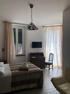 Letto o letti in una camera di Alla Porta Di Sotto B&B