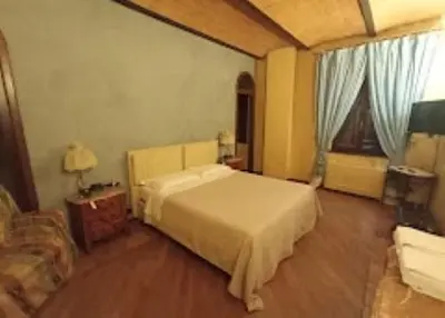 Letto o letti in una camera di Da Maxim