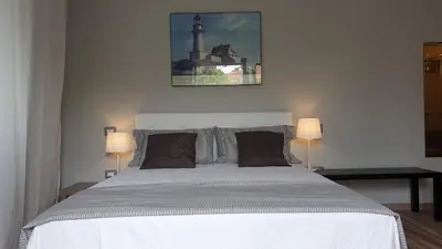 Letto o letti in una camera di PATTY'S GUESTHOUSE
