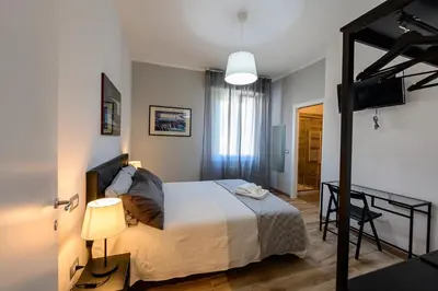 Letto o letti in una camera di PATTY'S GUESTHOUSE