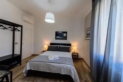 Letto o letti in una camera di PATTY'S GUESTHOUSE