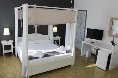 Letto o letti in una camera di B&B Il Ponticello