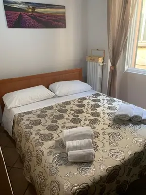 Letto o letti in una camera di La finestra sul Duomo di Pavia