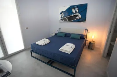 Letto o letti in una camera di Casa Elisa Dimora Urbana