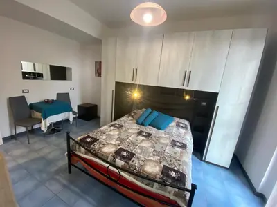 Letto o letti in una camera di Villa Caribe affittacamere