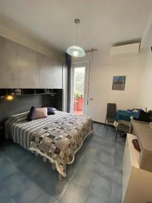 Letto o letti in una camera di Villa Caribe affittacamere