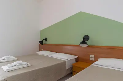 Letto o letti in una camera di UniHo Hostel
