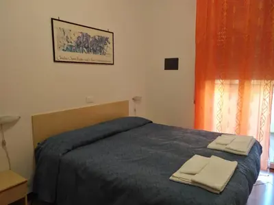 Letto o letti in una camera di Hotel Suisse
