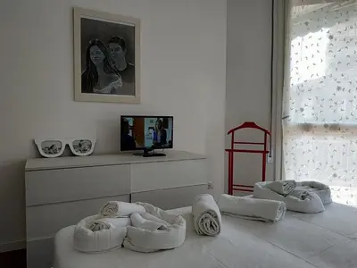 Letto o letti in una camera di CASAVIVA - Casa Vacanze Betti a Rapallo con terrazza