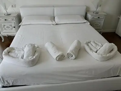 Letto o letti in una camera di CASAVIVA - Casa Vacanze Betti a Rapallo con terrazza