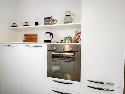 Cucina o angolo cottura di CASAVIVA - Casa Vacanze Betti a Rapallo con terrazza