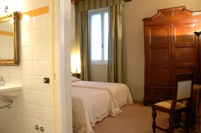 Letto o letti in una camera di Alle Roncole