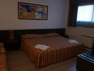 Letto o letti in una camera di Green Hotel