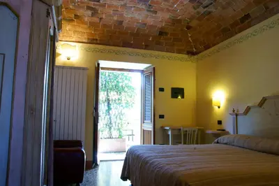 Letto o letti in una camera di Locanda Ristorante Gavarini