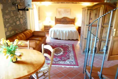 Letto o letti in una camera di Locanda Ristorante Gavarini