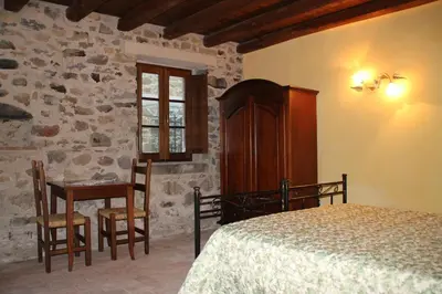 Letto o letti in una camera di Agriturismo I Chiosi