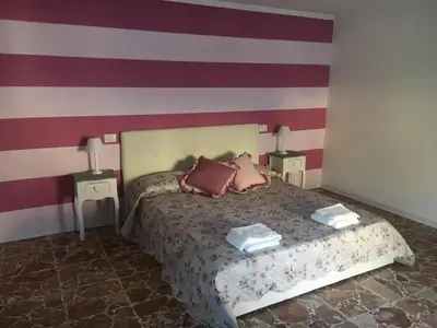 Letto o letti in una camera di B & B Pratopiano