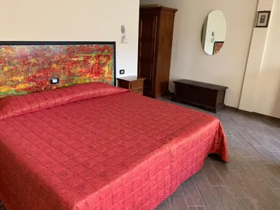 Letto o letti in una camera di Hotel Il Casale Verde Resort