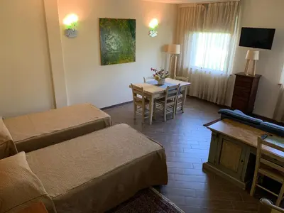 TV o dispositivi per l'intrattenimento presso Hotel Il Casale Verde Resort