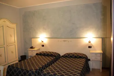 Letto o letti in una camera di Albergo La Piana