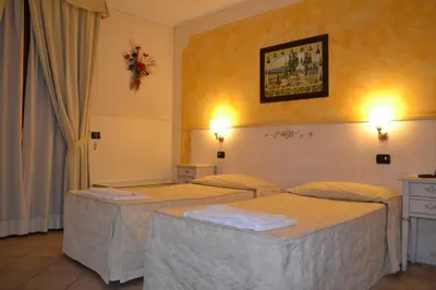 Letto o letti in una camera di Albergo La Piana