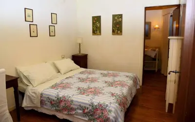 Letto o letti in una camera di B&B Il Bijou
