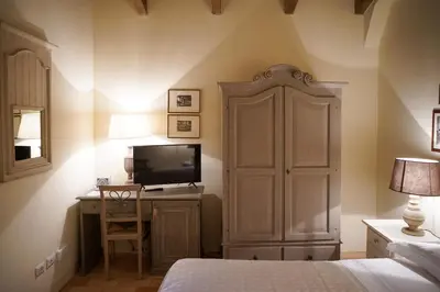 Letto o letti in una camera di Parco di Montebello
