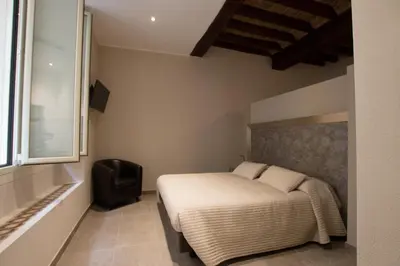 Letto o letti in una camera di Residenza Solferino