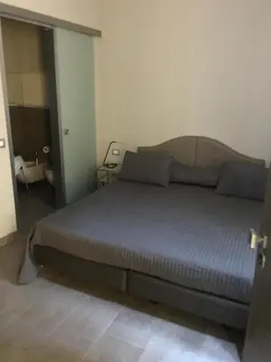 Letto o letti in una camera di Residenza Solferino