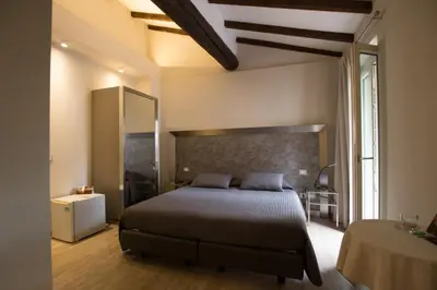 Letto o letti in una camera di Residenza Solferino