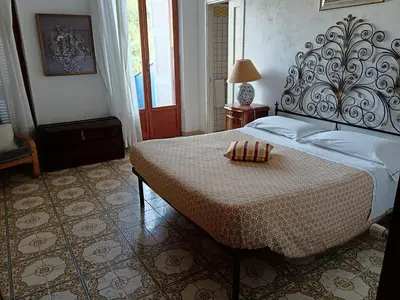 Letto o letti in una camera di Casa vancanza Sciamandola