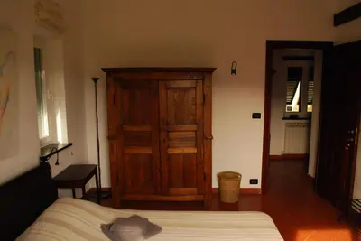 Letto o letti in una camera di Villa Maia