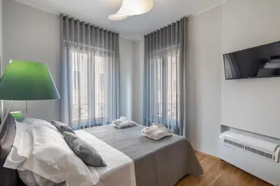 Letto o letti in una camera di 30Cavour luxury suites